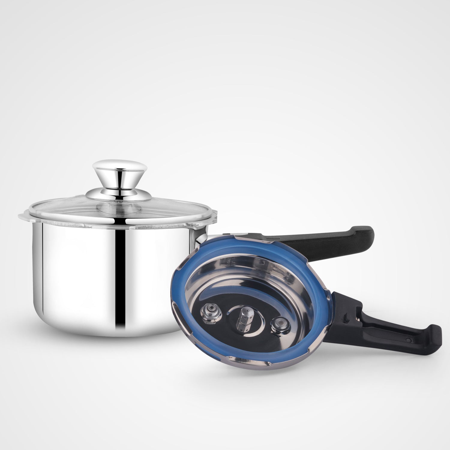 1.5-liter Nexen Triply Pressure Cooker shown open with a stainless steel pot, pressure lid displaying the inner blue silicone gasket, and a separate glass lid with knob.